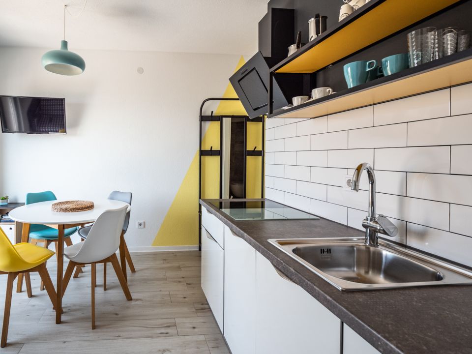 Apartment A2+1, first floor - kitchen and dining table