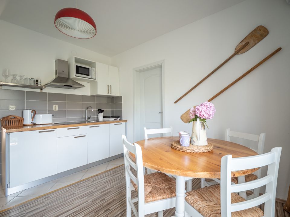 Apartment A2+1, ground floor - kitchen and dining table